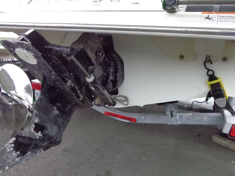 Slide: The Image of 2009 Glastron GT 185 boat stern with propeller and trailer detail. - 28