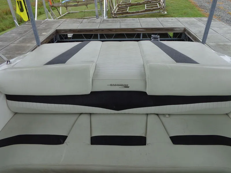 Slide: The Image of 2009 Glastron GT 185 boat interior with white and black seating. - 36