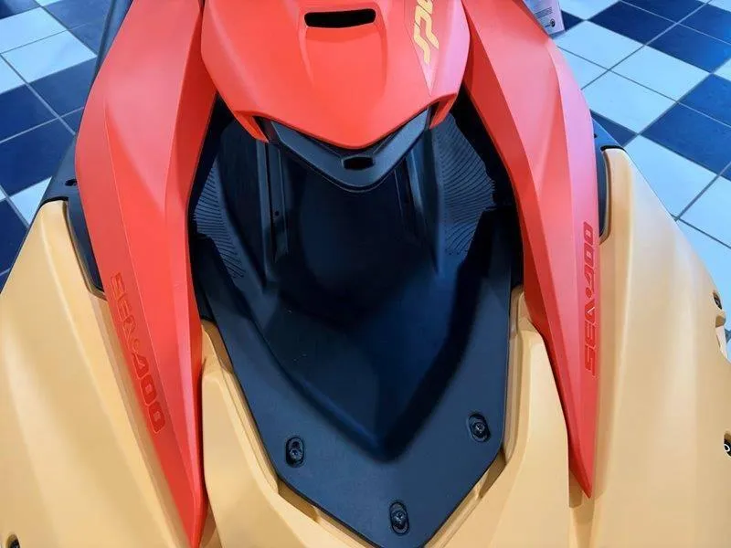 Slide: The Image of 2024 Sea-Doo Spark for 3 Rotax 900 ACE-90 iBR, vibrant red and yellow design. - 10