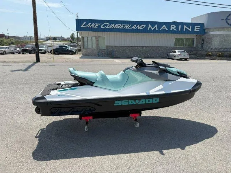 Slide: The Image of 2024 Sea-Doo GTI 130 jet ski displayed at Lake Cumberland Marine dealership. - 11