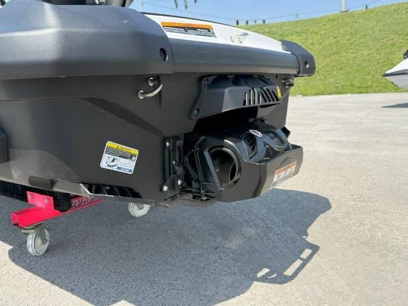 Slide: The Image of Rear view of 2024 Sea-Doo GTI 130 jet ski on a dolly, showcasing propulsion system. - 14