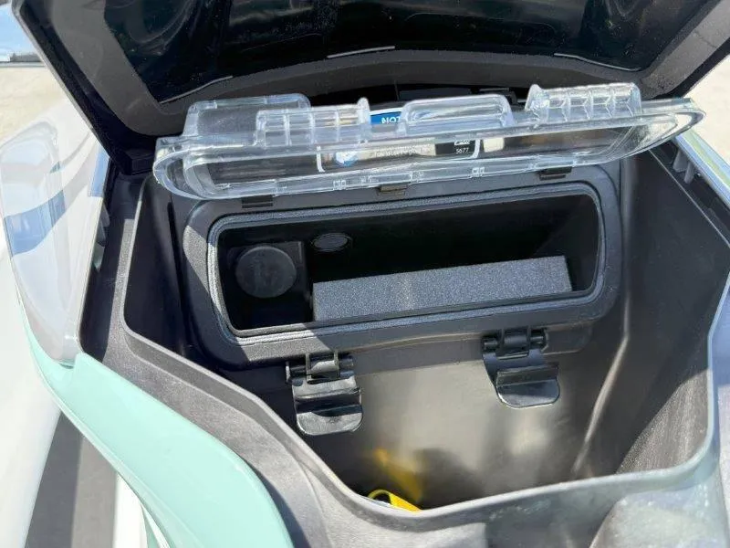 Slide: The Image of Open storage compartment of 2024 Sea-Doo GTI 130 watercraft. - 26