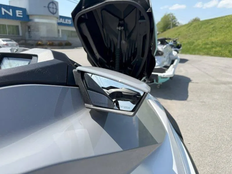 Slide: The Image of 2024 Sea-Doo GTI 130 close-up, featuring side mirror and open storage compartment. - 36
