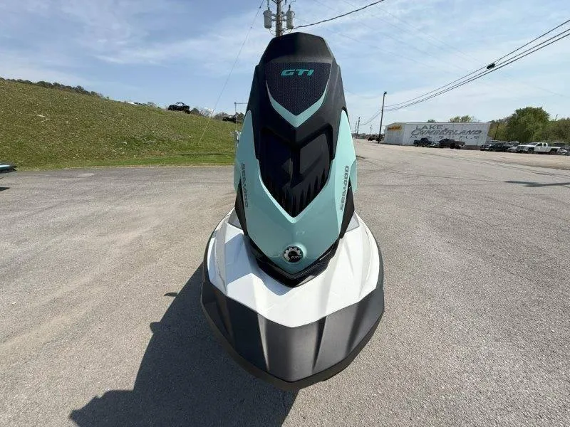 Slide: The Image of 2024 Sea-Doo GTI 130 jet ski, front view, parked on a sunny day. - 38