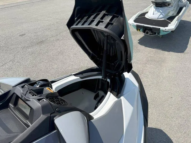 Slide: The Image of 2024 Sea-Doo GTI 130 with open storage compartment, showcasing sleek design and functionality. - 39