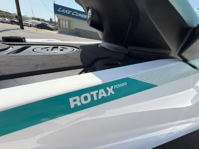 Slide: The Image of 2024 Sea-Doo GTI 130 with Rotax engine, parked near Lake Cumberland sign. - 40