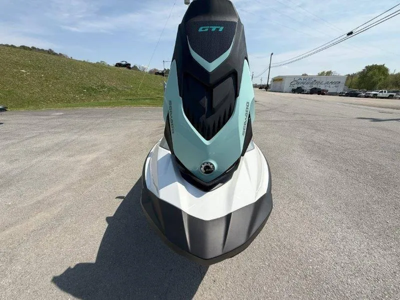 Slide: The Image of 2024 Sea-Doo GTI 130 jet ski on a paved surface, front view. - 41