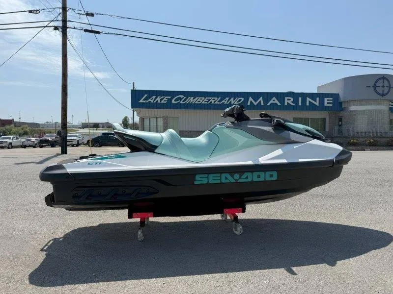 Slide: The Image of 2024 Sea-Doo GTI 130 jet ski displayed at Lake Cumberland Marine dealership. - 5
