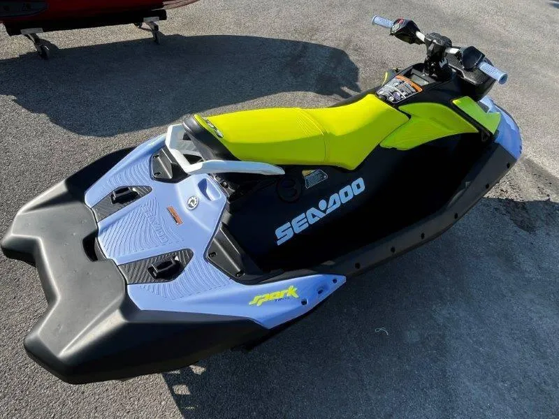 Slide: The Image of 2024 Sea-Doo Spark Trixx jet ski with vibrant yellow seat and sleek design. - 13