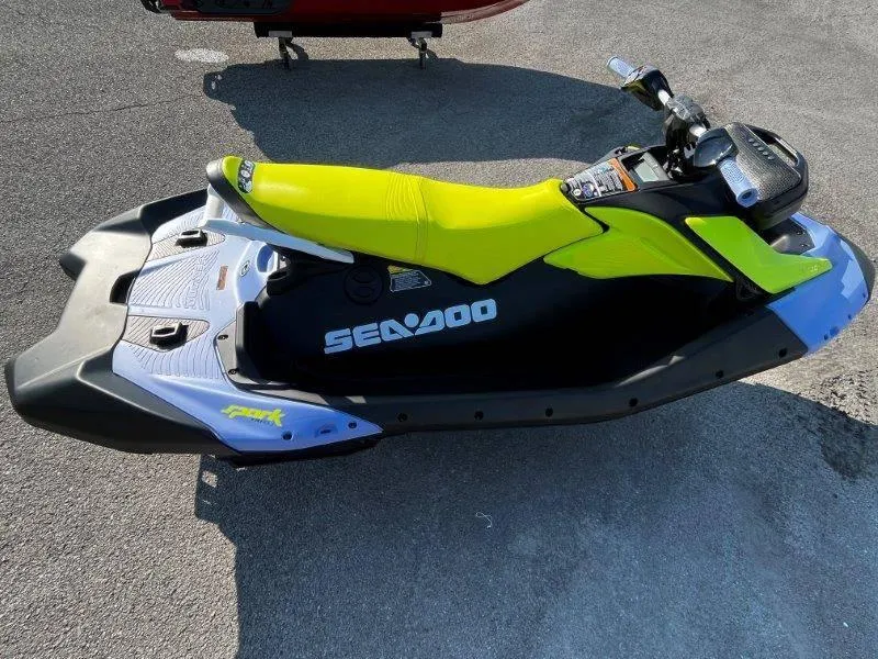 Slide: The Image of 2024 Sea-Doo Spark Trixx jet ski with vibrant yellow seat and sleek design. - 30