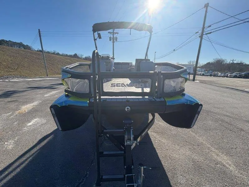 Slide: The Image of 2023 Sea-Doo SWITCH SPORT 21' 230HP boat on trailer, sunny day. - 11