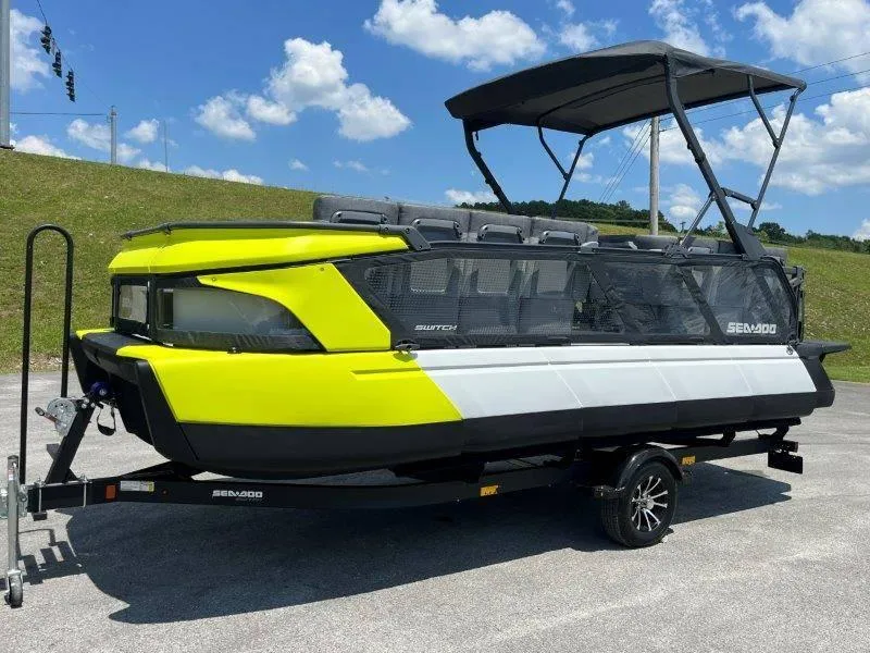 Slide: The Image of 2024 Sea-Doo Switch Cruise 21' 230HP boat on trailer, vibrant yellow and black design. - 10