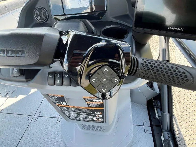 Slide: The Image of 2024 Sea-Doo Switch Cruise 21' 230HP dashboard with Garmin navigation system. - 20