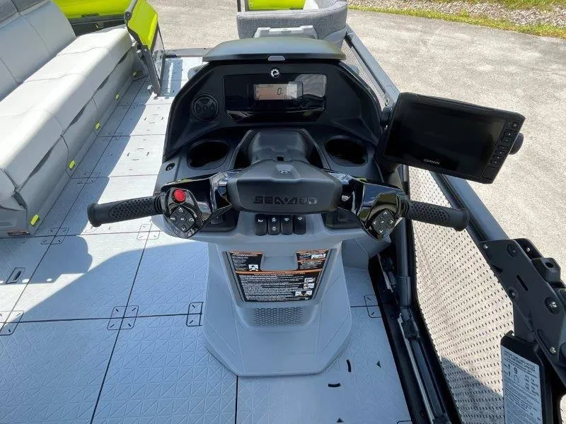 Slide: The Image of 2024 Sea-Doo Switch Cruise 21' 230HP dashboard with steering and controls. - 21