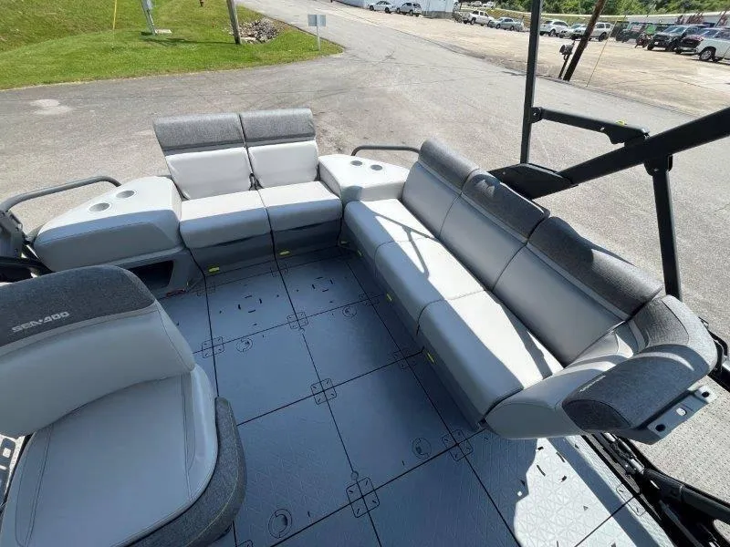 Slide: The Image of 2024 Sea-Doo Switch Cruise 21' 230HP interior seating area, spacious and comfortable. - 22