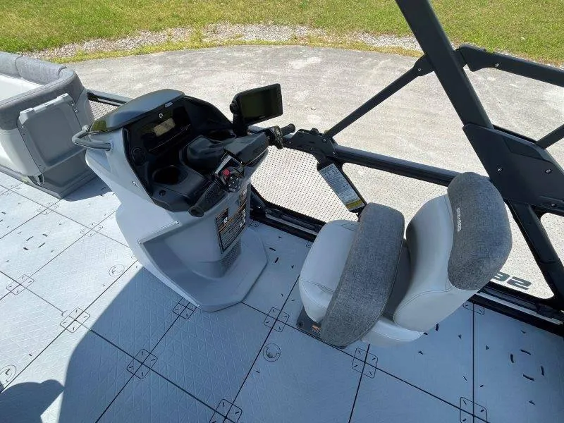 Slide: The Image of 2024 Sea-Doo Switch Cruise 21' 230HP helm with seating and controls. - 23