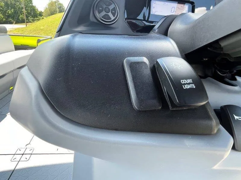 Slide: The Image of Close-up of 2024 Sea-Doo Switch Cruise 21' dashboard with court lights switch. - 28