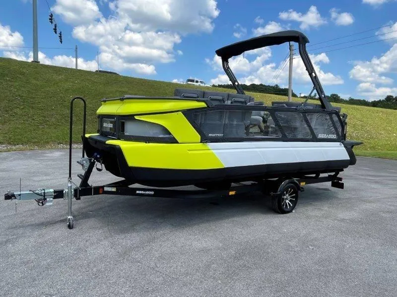 Slide: The Image of 2024 Sea-Doo Switch Cruise 21' 230HP boat on trailer, vibrant yellow and black design. - 38