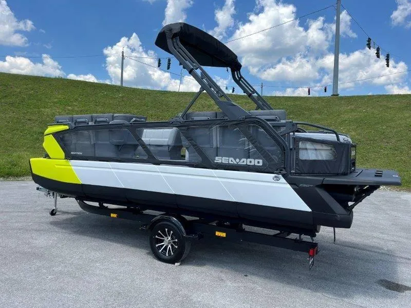 Slide: The Image of 2024 Sea-Doo Switch Cruise 21' 230HP boat on trailer, parked outdoors. - 40