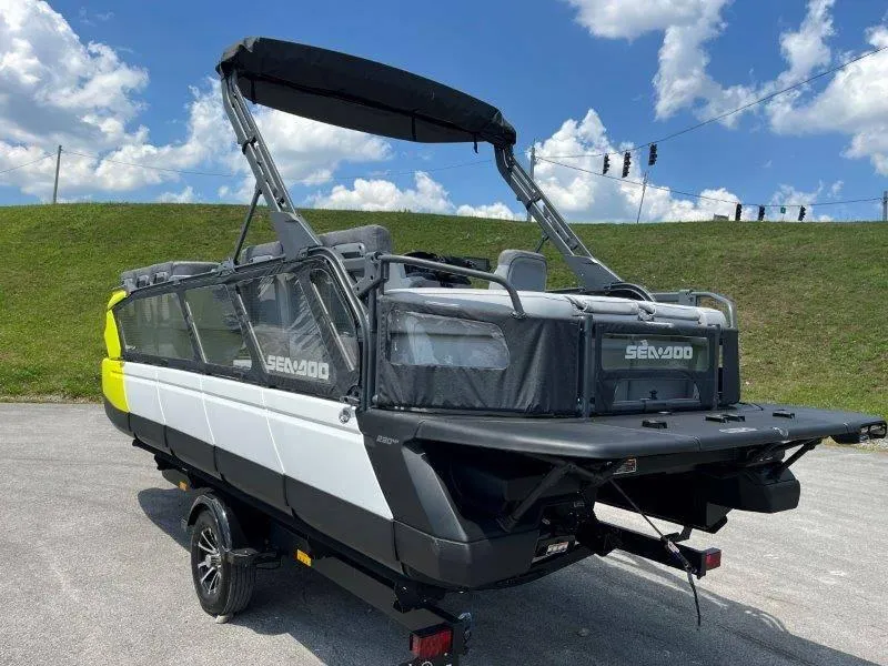 Slide: The Image of 2024 Sea-Doo Switch Cruise 21' 230HP boat on trailer under blue sky. - 41