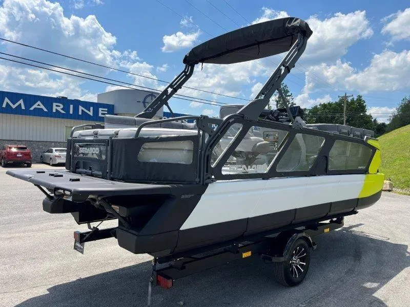 Slide: The Image of 2024 Sea-Doo Switch Cruise 21' 230HP boat on trailer, parked outdoors. - 43