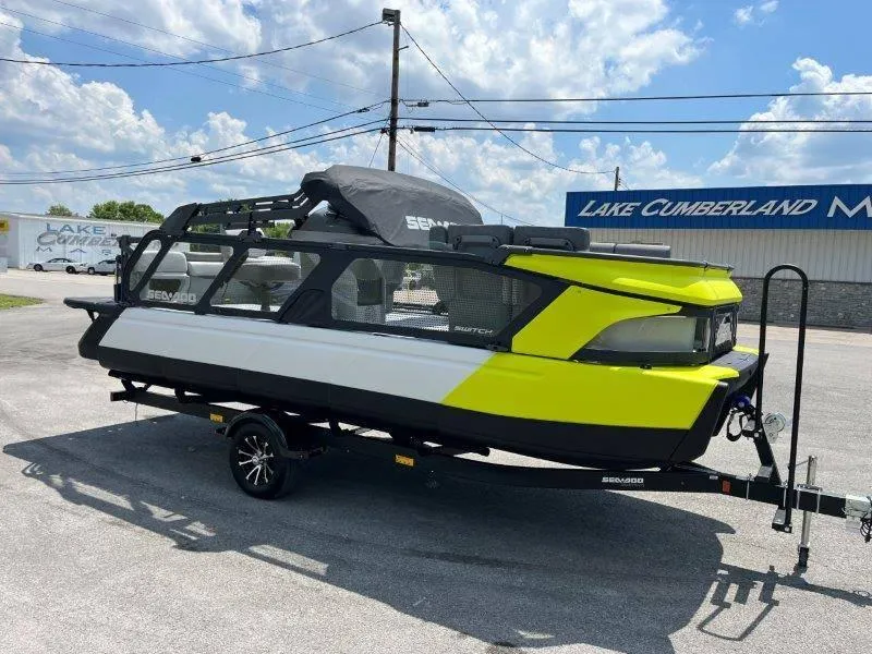 Slide: The Image of 2024 Sea-Doo Switch Cruise 21' 230HP boat on trailer, parked outdoors. - 48
