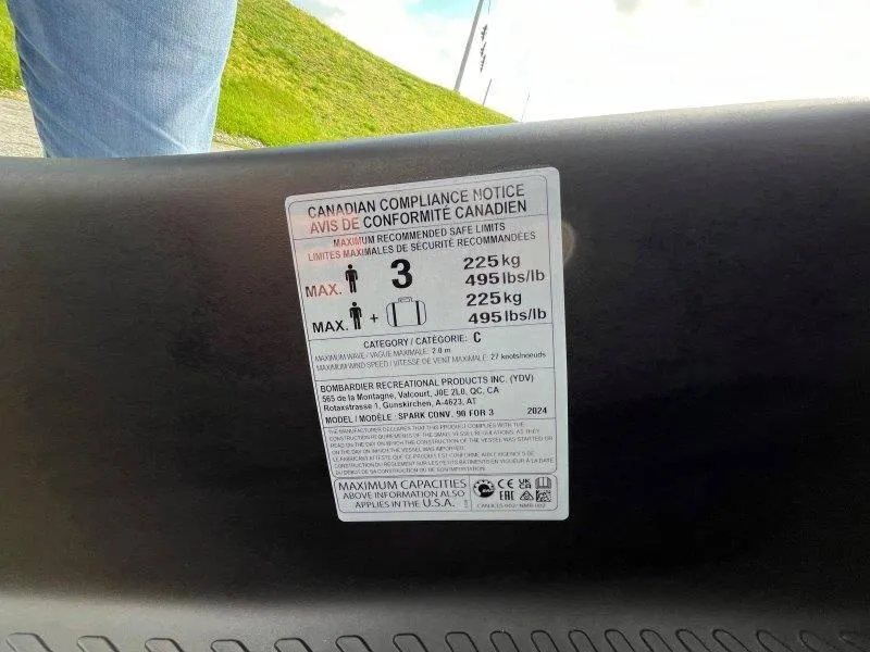 Slide: The Image of 2024 Sea-Doo Spark compliance notice showing weight limits and capacity details. - 28