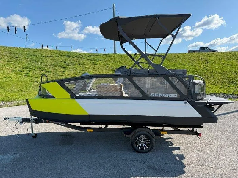 Slide: The Image of 2024 Sea-Doo SWITCH SPORT 18' 230HP boat on trailer, featuring a sleek design and vibrant colors. - 14