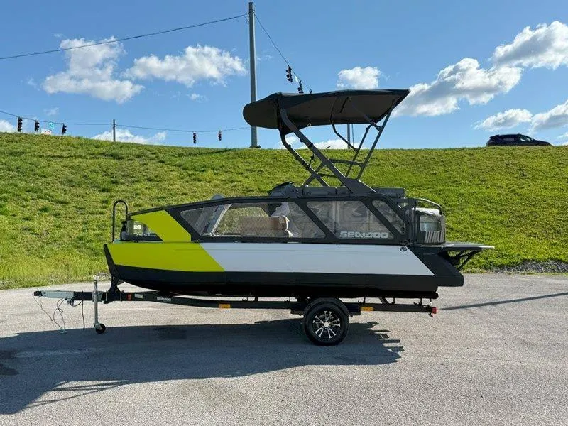 Slide: The Image of 2024 Sea-Doo SWITCH SPORT 18' 230HP boat on trailer under clear sky. - 15