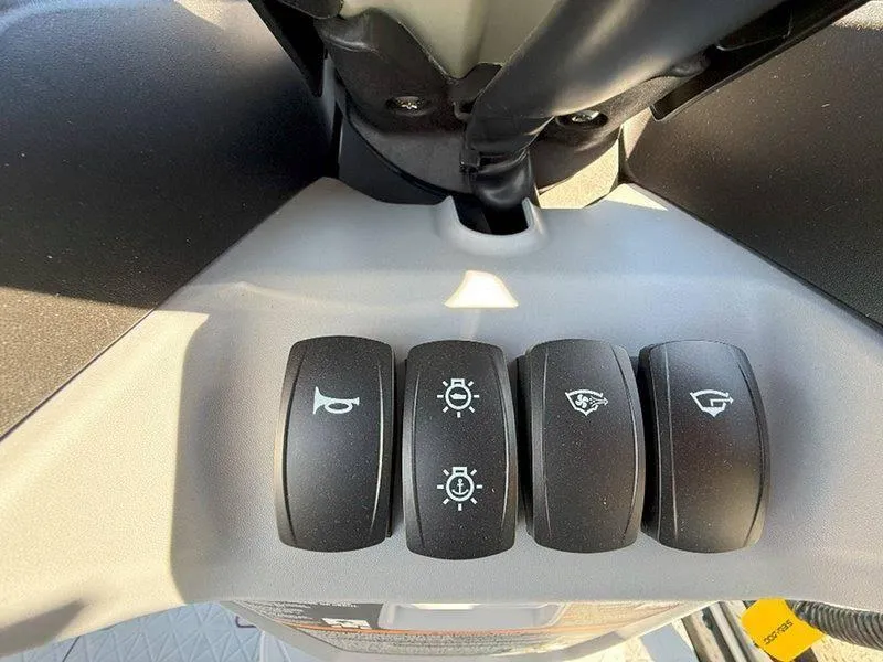 Slide: The Image of Control panel of 2024 Sea-Doo SWITCH SPORT 18' 230HP with various switches. - 17