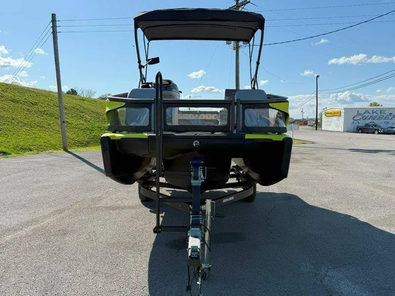 Slide: The Image of 2024 Sea-Doo SWITCH SPORT 18' 230HP boat on trailer, parked outdoors. - 18