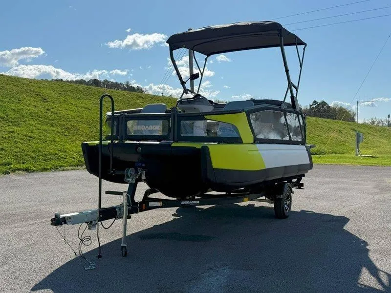 Slide: The Image of 2024 Sea-Doo SWITCH SPORT 18' 230HP boat on trailer, parked outdoors. - 19