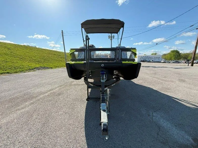 Slide: The Image of 2024 Sea-Doo SWITCH SPORT 18' 230HP on trailer, parked outdoors under clear sky. - 21