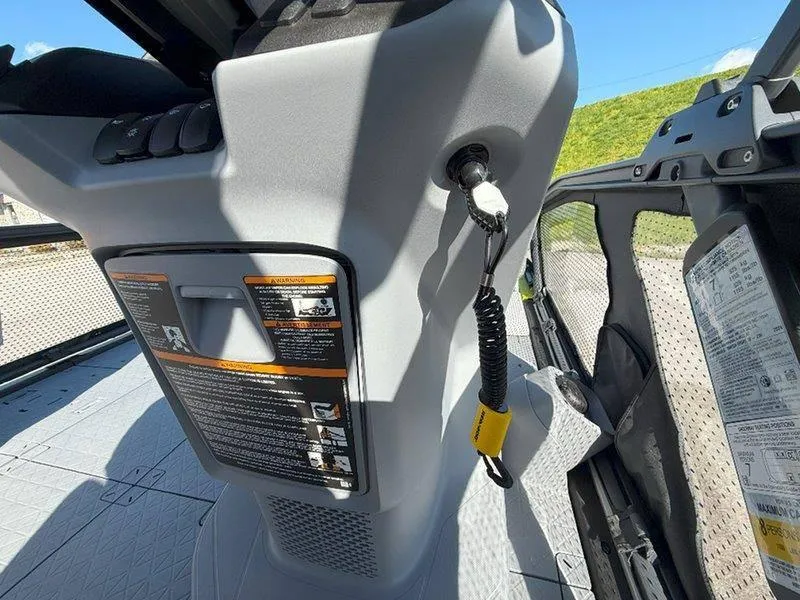 Slide: The Image of 2024 Sea-Doo SWITCH SPORT 18' 230HP dashboard with safety lanyard and control panel. - 22