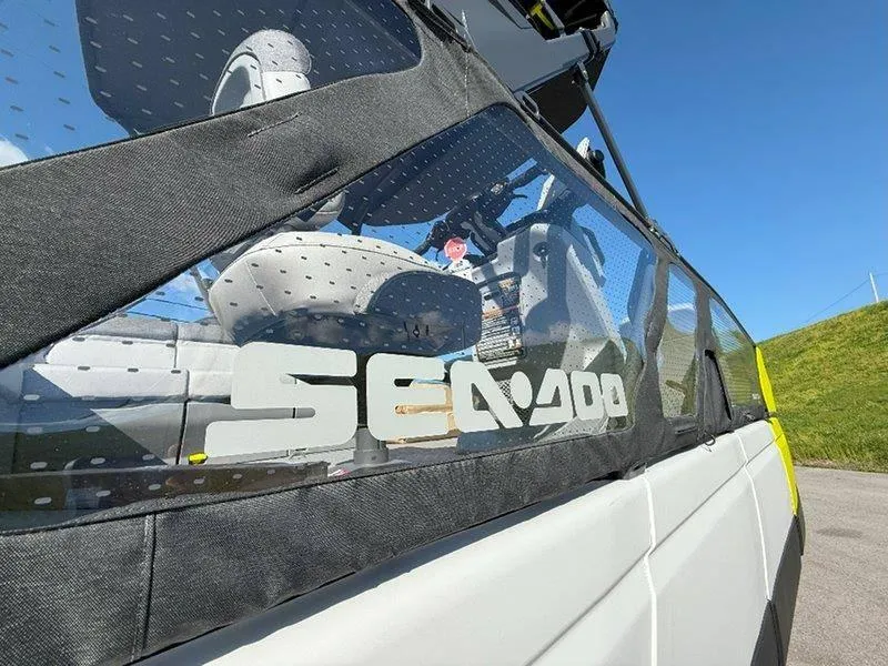 Slide: The Image of 2024 Sea-Doo SWITCH SPORT 18' 230HP boat, side view with logo and seating. - 23