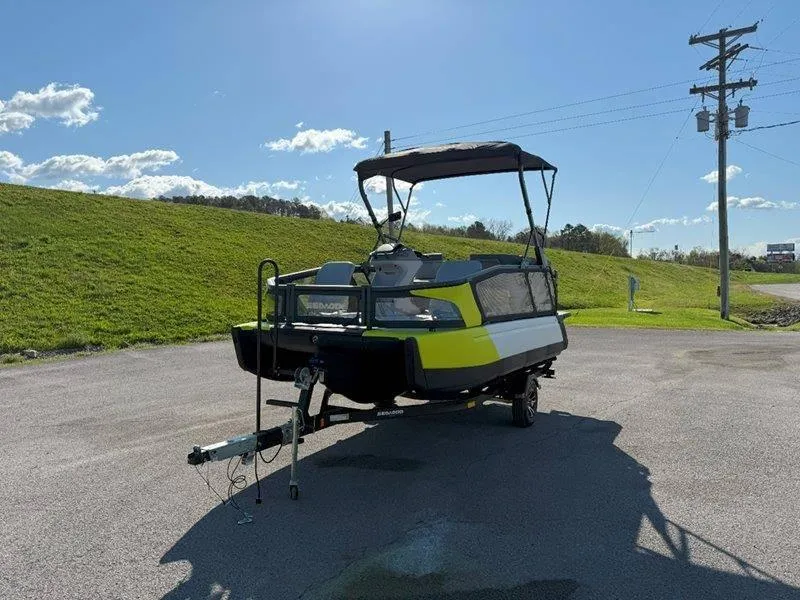 Slide: The Image of 2024 Sea-Doo SWITCH SPORT 18' 230HP boat on trailer under clear sky. - 24