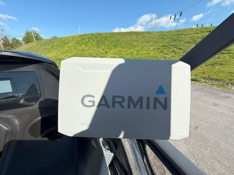 Slide: The Image of Garmin device on 2024 Sea-Doo SWITCH SPORT 18' 230HP, sunny day background. - 25
