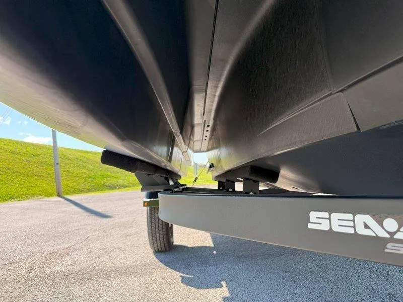 Slide: The Image of Underneath view of 2024 Sea-Doo SWITCH SPORT 18' 230HP on a trailer. - 26