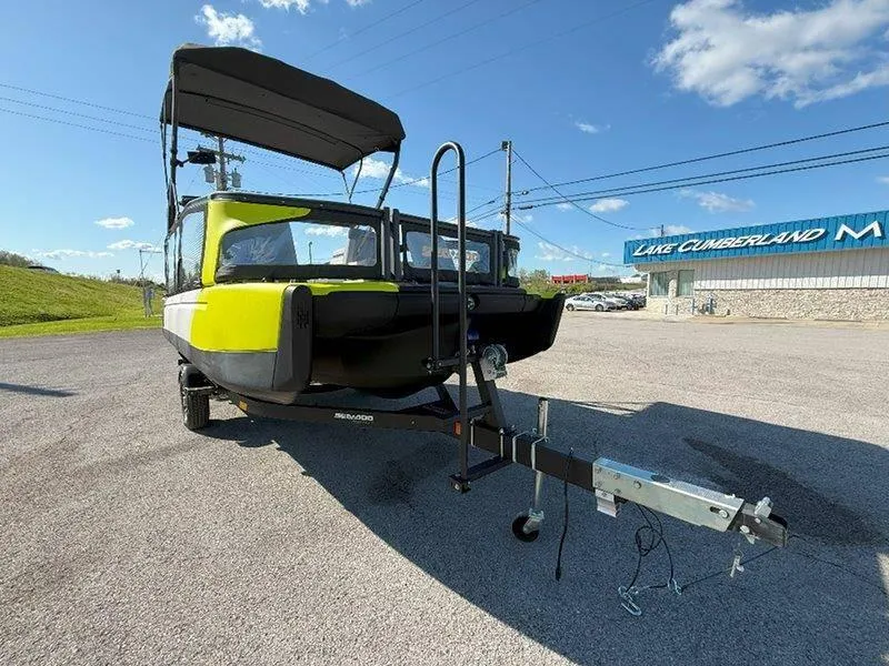 Slide: The Image of 2024 Sea-Doo SWITCH SPORT 18' 230HP on trailer, parked near Lake Cumberland dealership. - 27