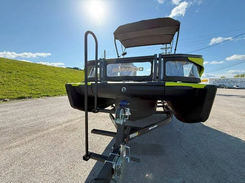 Slide: The Image of 2024 Sea-Doo SWITCH SPORT 18' 230HP on trailer under clear blue sky. - 31