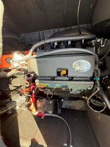 Slide: The Image of 2024 Sea-Doo SWITCH SPORT 18' 230HP engine compartment showcasing Rotax engine components. - 34