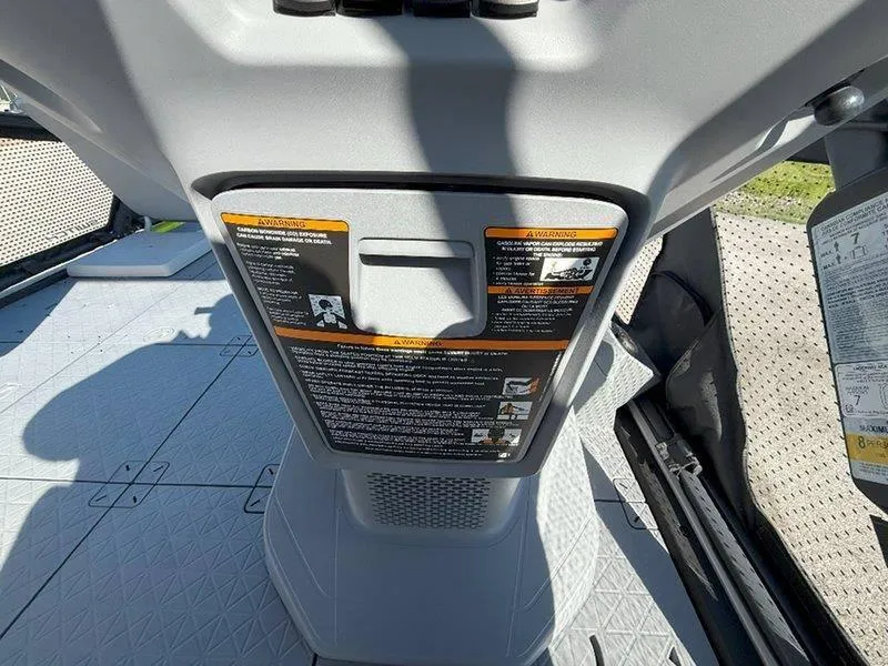 Slide: The Image of 2024 Sea-Doo SWITCH SPORT 18' 230HP interior with safety instructions and textured flooring. - 38