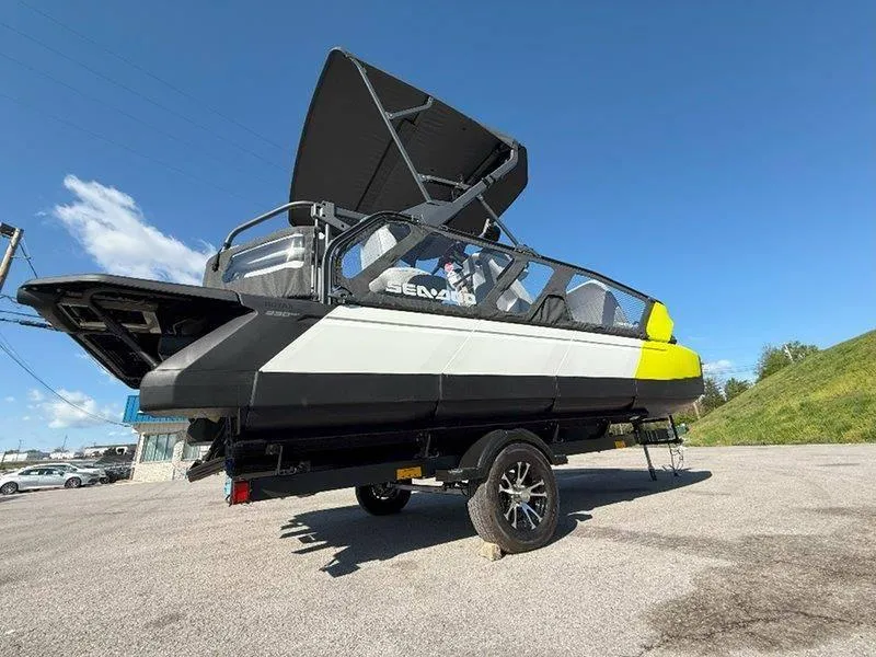 Slide: The Image of 2024 Sea-Doo SWITCH SPORT 18' 230HP boat on trailer under clear blue sky. - 43