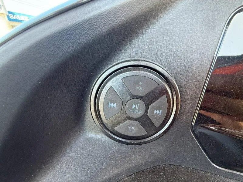 Slide: The Image of Control panel of 2024 Sea-Doo SWITCH SPORT 18' 230HP with volume and power buttons. - 44