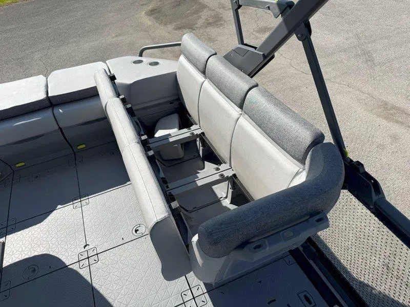 Slide: The Image of 2024 Sea-Doo SWITCH SPORT 18' 230HP boat interior with gray seating and deck. - 47