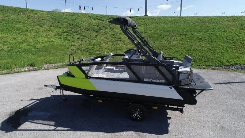 Slide: The Image of 2024 Sea-Doo SWITCH SPORT 18' 230HP boat on trailer, parked outdoors. - 7