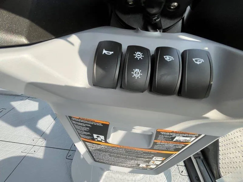 Slide: The Image of 2024 Sea-Doo SWITCH SPORT 18' 230HP dashboard controls, featuring various function buttons. - 25