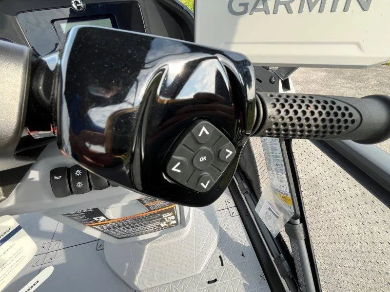 Slide: The Image of Close-up of 2024 Sea-Doo SWITCH SPORT 18' 230HP steering controls with Garmin display. - 26