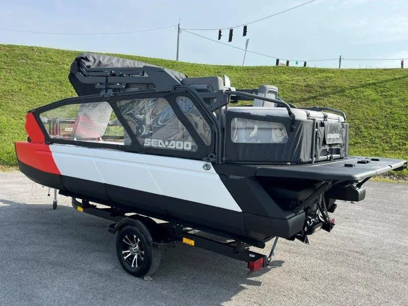 Slide: The Image of 2024 Sea-Doo SWITCH SPORT 18' 230HP on trailer, parked outdoors. - 42
