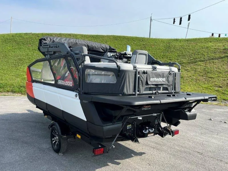 Slide: The Image of 2024 Sea-Doo SWITCH SPORT 18' 230HP on trailer, parked outdoors. - 46